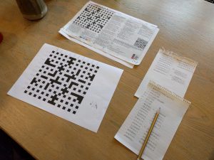 A photo of our crossword notes and workings